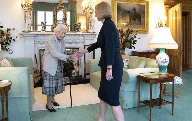 Britain's Queen Elizabeth II and new Conservative Party leader and Britain's Prime Minister-elect Liz Truss meet at Balmoral Castle in Ballater, Scotland, on September 6, 2022, where the Queen invited Truss to form a Government. - Truss will formally take office Tuesday, after her predecessor Boris Johnson tendered his resignation to Queen Elizabeth II. (Photo by Jane Barlow / POOL / AFP)