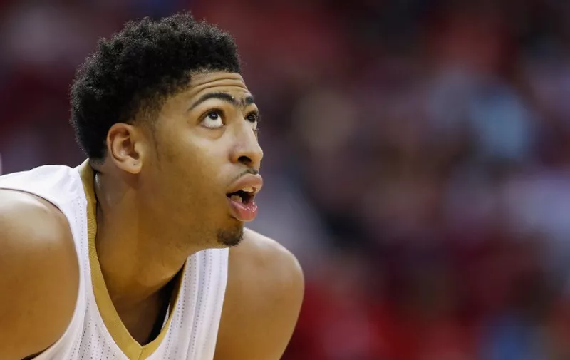 HOUSTON, TX - DECEMBER 18: HOUSTON, TX - DECEMBER18: Anthony Davis #23 of the New Orleans Pelicans waits on the court during their game against the Houston Rockets at the Toyota Center on December18, 2014 in Houston, Texas. NOTE TO USER: User expressly acknowledges and agrees that, by downloading and/or using this photograph, user is consenting to the terms and conditions of the Getty Images License Agreement.   Scott Halleran/Getty Images/AFP