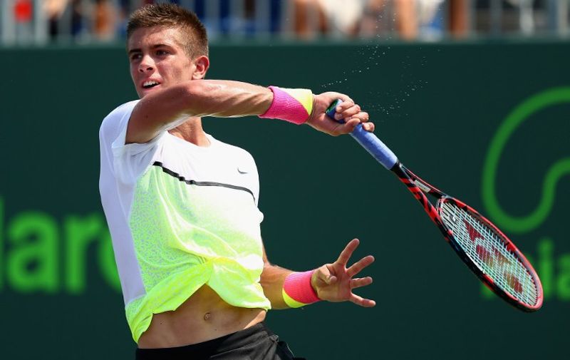 KEY BISCAYNE, FL - MARCH 26: of Croatia in action against Andreas Haider-Maurer of Austria in their first round match during the Miami Open at Crandon Park Tennis Center on March 26, 2015 in Key Biscayne, Florida.   /AFP