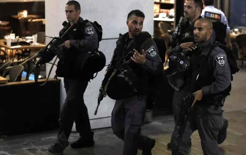 Israeli security forces walk at a shopping complex in the Mediterranean coastal city of Tel Aviv following a shooting attack on June 8, 2016.



At least three people were killed and several wounded in the shooting spree, emergency services said. Police said that it appeared to be a militant attack, but they could not immediately give any details of the attacker or victims.

 / AFP PHOTO / JACK GUEZ