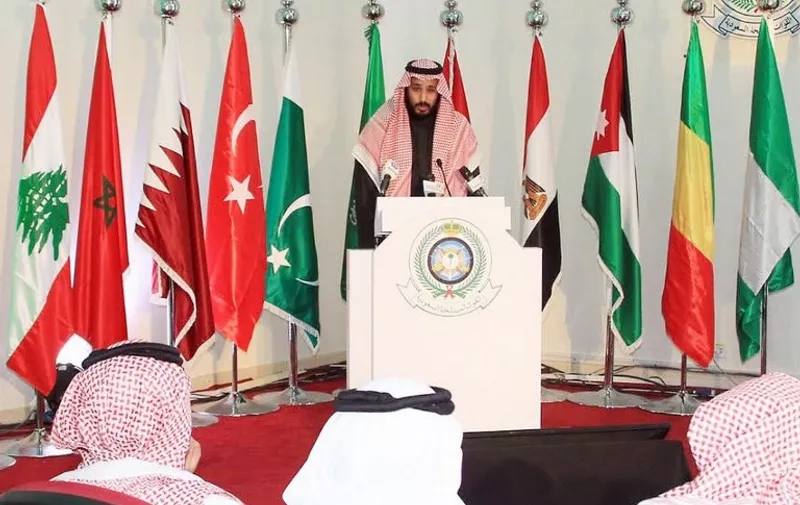A handout picture provided by the Saudi Press Agency (SPA) on December 15, 2015, shows Saudi Defence Minister and Deputy Crown Prince Mohammed bin Salman holding a press conference on December 14, 2015, at King Salman airbase in Riyadh. Saudi Arabia announced the formation of a military coalition of 34 countries including Gulf states, Egypt and Turkey to fight "terrorism" in the Islamic world. AFP PHOTO / HO / SPA === RESTRICTED TO EDITORIAL USE - MANDATORY CREDIT "AFP PHOTO / HO / SPA" - NO MARKETING NO ADVERTISING CAMPAIGNS - DISTRIBUTED AS A SERVICE TO CLIENTS === / AFP / SPA / -