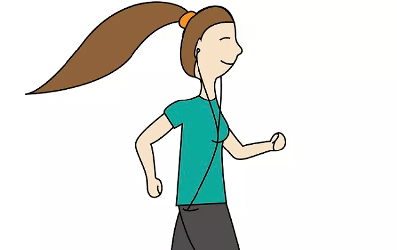 The girl in sportswear running, listening to music . It's time to lose weight and exercise. The path to success.