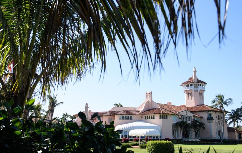 (FILES) This file photo taken on April 18, 2018, shows US President Donald Trump's Mar-a-Lago resort in Palm Beach, Florida. - A Chinese woman carrying multiple cellphones and thumb drives bearing malware was arrested on March 30, 2019, at the resort while the president was staying there, court documents revealed on April 2. An arrest document in the federal district court of Palm Beach, Florida says Zhang Yujing tried to gain entry into Mar-a-Lago on Saturday, first claiming she was a member headed to the pool and then claiming to be attending a non-existent Chinese-American event. (Photo by MANDEL NGAN / AFP)