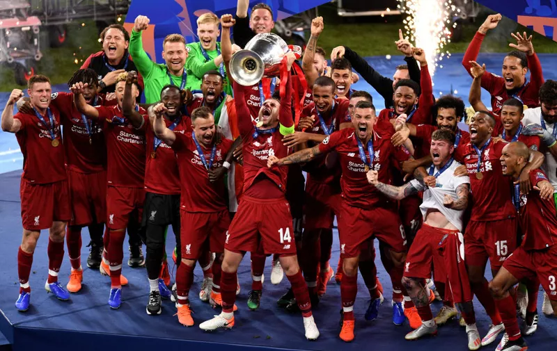 MADRID, SPAIN &#8211; JUNE 01: Jordan Henderson of Liverpool lifts the Champions League Trophy after winning the UEFA Champions League Final between Tottenham Hotspur and Liverpool at Estadio Wanda Metropolitano on June 01, 2019 in Madrid, Spain. (Photo by David Ramos/Getty Images)