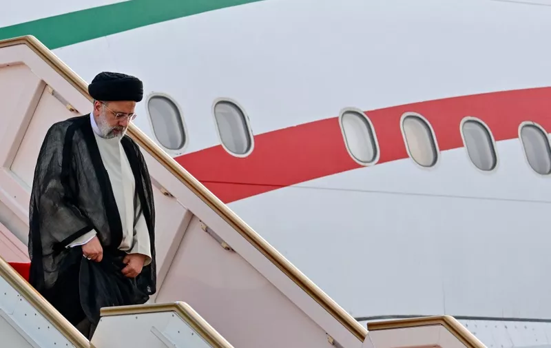 Iran's President Ebrahim Raisi arrives at Bandaranaike International Airport in Katunayake near Colombo on April 24, 2024. Raisi arrived in Sri Lanka on April 24 to inaugurate a power and irrigation project, unaccompanied by his interior minister who is being sought for arrest over a deadly 1994 bombing. (Photo by Ishara S.Kodikara / AFP)