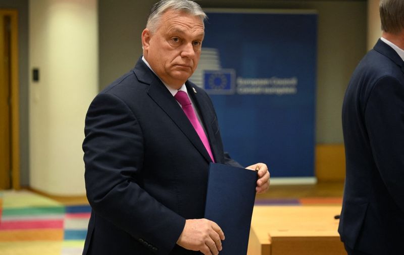 Hungary's Prime Minister Viktor Orban arrives for a roundtable meeting of the European Council at the European headquarters in Brussels, on December 14, 2023. EU leaders agreed on December 14, 2023, to open talks with Ukraine on joining the bloc, after Hungarian Prime Minister Viktor Orban ducked out of his threat to veto the plan. The EU's 27 leaders were focused at a crunch summit in Brussels on granting Kyiv a four-year 50-billion-euro ($55-billion) funding package and an agreement to launch formal EU talks for Ukraine on joining the bloc. (Photo by Miguel MEDINA / AFP)