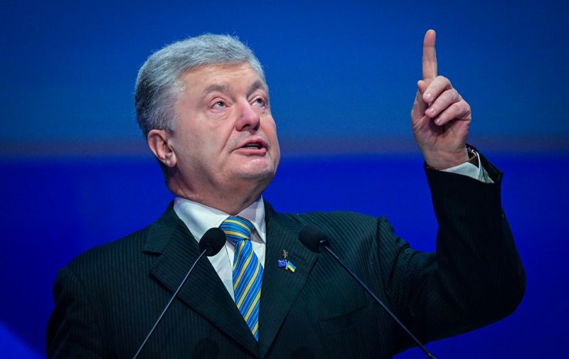Former Ukrainian President Petro Poroshenko gestures as he addresses the audience at the European People Party group's Congress (EPP) in Bucharest, Romania, on March 6, 2024. (Photo by Daniel MIHAILESCU / AFP)