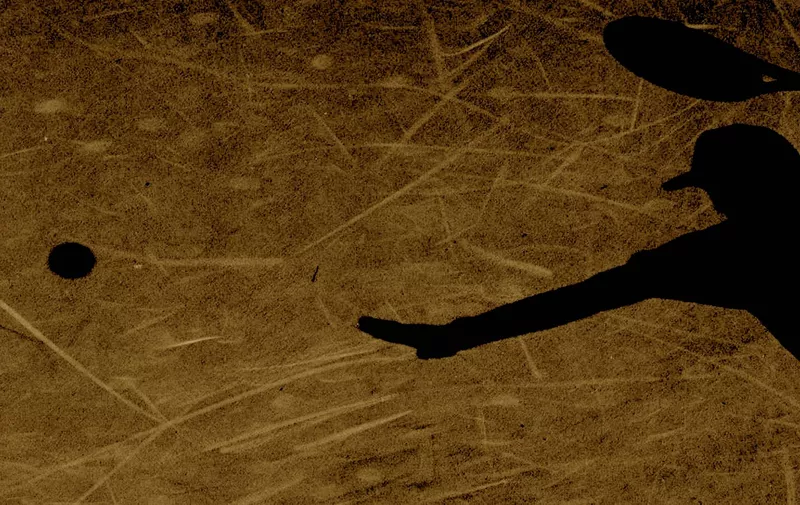 10 Sep 1995:  The shadow of a tennis player as he begins to serve during the 1995 US Open in Flushing Meadows, New York. Mandatory Credit: Simon Bruty  /Allsport