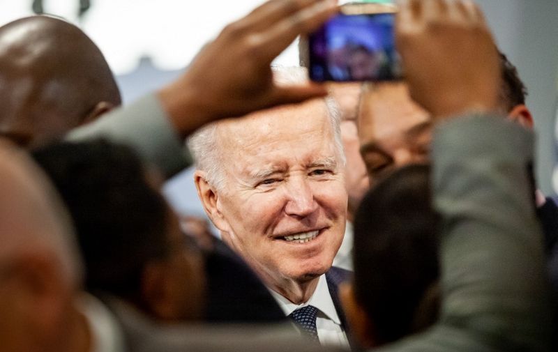 President Joe Biden shakes hands and takes selfies with attendees at the National Action Network's annual MLK Day breakfast.  Biden was the keynote speaker at an event honoring fomer House Speaker Nancy Pelosi, Arndrea Waters King of the Drum Major Institute, Minyon Moore of Dewey Square Group, and Ray Curry of the United Automobile, Aerospace, and Agricultural Implement Workers (UAW) union for their contributions to civil rights in the United States. (Photo by Allison Bailey/NurPhoto) (Photo by Allison Bailey / NurPhoto / NurPhoto via AFP)