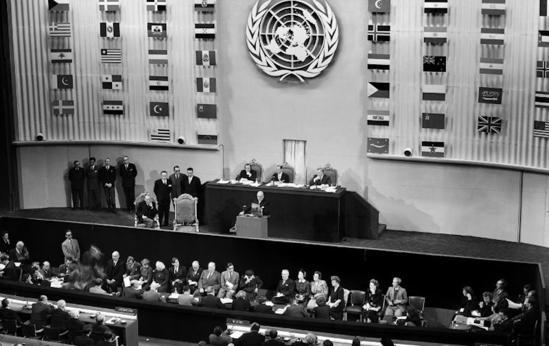(FILES) In this file photo taken on September 22, 1948 French President of Council Vincent Auriol pronounces a speech during the opening ceremony of the third United Nations Assembly at the close of which, on December 10, 1948, was adopted the Universal Declaration of Human Rights at the Palais de Chaillot in Paris. - As the Universal Declaration of Human Rights turns 70, there are signs that the goals outlined in the text are facing unprecedented threats, from rising nationalism to a worldwide assault on multilateral institutions. This week, the United Nations High Commissioner for Human Rights, Michelle Bachelet, warned that the global system "that gave teeth to the vision of the Universal Declaration is being chipped away by governments and politicians increasingly focused on narrow, nationalist interests." (Photo by STRINGER / AFP)