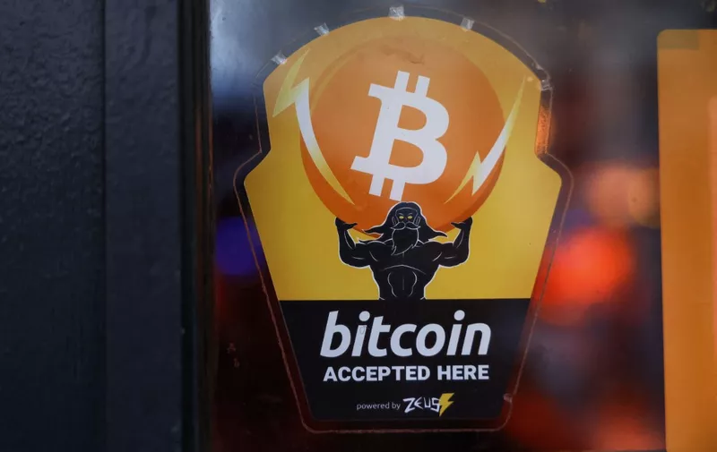 NEW YORK, NEW YORK - FEBRUARY 29: A Bitcoin Accepted Here sticker is seen at Pubkey Bar on February 29, 2024 in New York City. The price of bitcoin reached $63,000 on Wednesday for the first time since the peak of the last bull market in November 2021, which coincided with the U.S. traded spot ETFs.   Michael M. Santiago/Getty Images/AFP (Photo by Michael M. Santiago / GETTY IMAGES NORTH AMERICA / Getty Images via AFP)