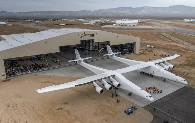 The Stratolaunch plane is pushed out of the hanger for the first time in the Mojave desert, California on May 31, 2017.
A colossal rocket-launching plane touted as the future of space travel is closer to testing, having been rolled out of a hangar in the desert, its creators said. The project backed by billionaire Microsoft co-founder Paul Allen has been proceeding for about six years and was on track for its first launch demonstration as early at 2019, Stratolaunch Systems Corporation chief executive Jean Floyd said in a blog post.
 / AFP PHOTO / Stratolaunch Systems Corp / April Keller / RESTRICTED TO EDITORIAL USE - MANDATORY CREDIT "AFP PHOTO / Stratolaunch Systems Corp/ April Keller" - NO MARKETING NO ADVERTISING CAMPAIGNS - DISTRIBUTED AS A SERVICE TO CLIENTS