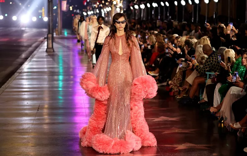 HOLLYWOOD, CALIFORNIA - NOVEMBER 02: A model walks the runway for Gucci Love Parade on November 02, 2021 in Hollywood, California.   Amy Sussman/Getty Images/AFP (Photo by Amy Sussman / GETTY IMAGES NORTH AMERICA / Getty Images via AFP)