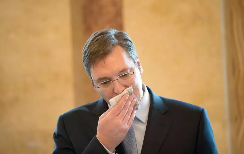 The Prime Minister of the Republic of Serbia, Aleksandar Vucic, wipes his face with a tissue in the New Palace in?Stuttgart,?Germany, 04 February 2015. PHOTO: MARIJAN?MURAT/dpa/DPA/PIXSELL