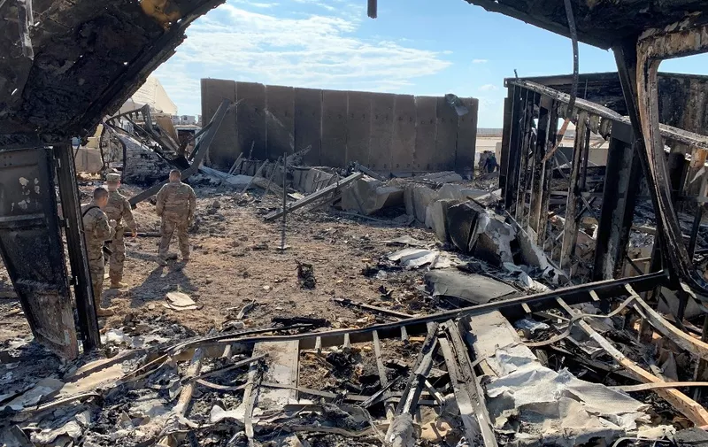 A picture taken on January 13, 2020 during a press tour organised by the US-led coalition fighting the remnants of the Islamic State group, shows a view of the damage at Ain al-Asad military airbase housing US and other foreign troops in the western Iraqi province of Anbar. - Iran last week launched a wave of missiles at the sprawling Ain al-Asad airbase in western Iraq and a base in Arbil, capital of Iraq's autonomous Kurdish region, both hosting US and other foreign troops, in retaliation for the US killing top Iranian general Qasem Soleimani in a drone strike in Baghdad on January 3. (Photo by Ayman HENNA / AFP)