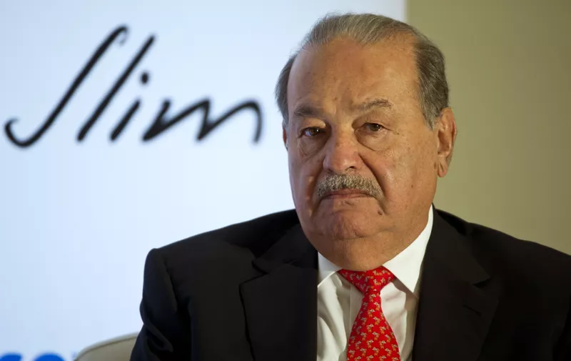 Mexican tycoon Carlos Slim participates in a press conference at the Soumaya Museum in Mexico City on January 29, 2014. The Slim Foundation signed an agreement with Coursera plataform to expand the acces and the opportunities of education and employment in Latin America. AFP PHOTO/ Yuri CORTEZ        (Photo credit should read YURI CORTEZ/AFP/Getty Images)