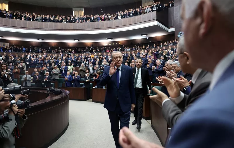 Turkey's President and leader of the Justice and Development (AK) Party, Recep Tayyip Erdogan attends a meeting to address the parliamentary group of his party at the Grand National Assembly of Turkey in Ankara on January 4, 2023. (Photo by Adem ALTAN / AFP)