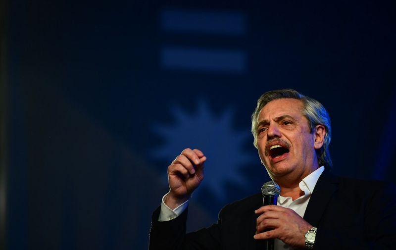 Argentina's presidential candidate for the Frente de Todos party Alberto Fernandez addresses supporters after being elected as new president, at the headquarters of the party in Buenos Aires after polls closed in Argentina's general election on October 27, 2019. - Peronist candidate Alberto Fernandez won Argentina's presidential election in the first round on Sunday, official results showed, bringing to an end the crisis-plagued rule of market-friendly incumbent Mauricio Macri. (Photo by RONALDO SCHEMIDT / AFP)