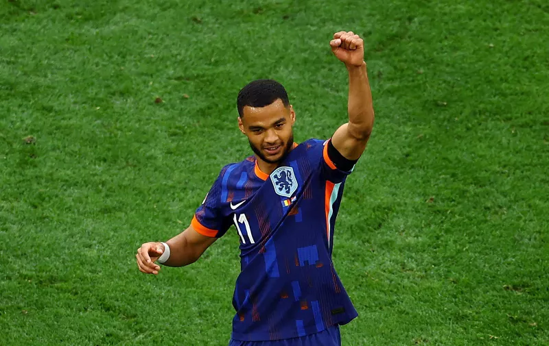 Soccer Football - Euro 2024 - Round of 16 - Romania v Netherlands - Munich Football Arena, Munich, Germany - July 2, 2024 Netherlands' Cody Gakpo celebrates scoring their first goal REUTERS/Leonhard Simon
