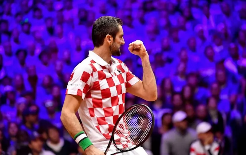 Croatia's Marin Cilic gestures as he celebrates a point during his singles rubber against France's Jo-Wilfried Tsonga during the Davis Cup final tennis match between France and Croatia at The Pierry-Mauroy Stadium at Villeneuve d'Ascq in northern France on November 23, 2018. (Photo by Philippe HUGUEN / AFP)
