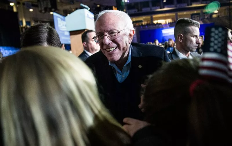 DURHAM, NH - FEBRUARY 08: Democratic presidential hopeful, Sen. Bernie Sanders (D-VT) shakes hands with audience members after speaking at a campaign rally and concert at the University of New Hampshire's Whittemore Center Arena on February 8, 2016 in Durham, New Hampshire. Sanders was campaigning on the eve of the New Hampshire primary, the nation's first.   Andrew Burton/Getty Images/AFP