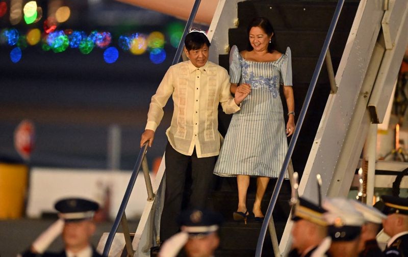 Philippine President Ferdinand Marcos, Jr., and First Lady Louise Marcos arrive at San Francisco International Airport in San Francisco, California, on November 14, 2023, as he arrives to attend the Asia-Pacific Economic Cooperation (APEC) leaders' week. The APEC Summit takes place through November 17. (Photo by Frederic J. Brown / AFP)