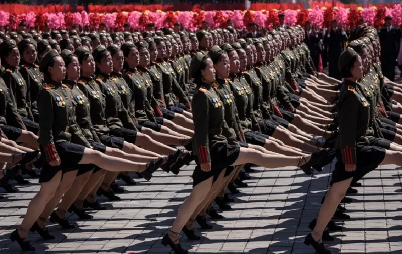 Korean People's Army (KPA) soldiers march during a mass rally on Kim Il Sung square in Pyongyang on September 9, 2018.
Thousands of North Korean troops followed by artillery and tanks paraded through Pyongyang on September 9 as the nuclear-armed country celebrated its 70th birthday, but it refrained from displaying the intercontinental ballistic missiles that have seen it hit with sanctions. / AFP PHOTO / Ed JONES / The erroneous mention[s] appearing in the metadata of this photo has been modified in AFP systems in the following manner: [BYLINE - ED JONES]. Please immediately remove the erroneous mention[s] from all your online services and delete it (them) from your servers. If you have been authorized by AFP to distribute it (them) to third parties, please ensure that the same actions are carried out by them. Failure to promptly comply with these instructions will entail liability on your part for any continued or post notification usage. Therefore we thank you very much for all your attention and prompt action. We are sorry for the inconvenience this notification may cause and remain at your disposal for any further information you may require.