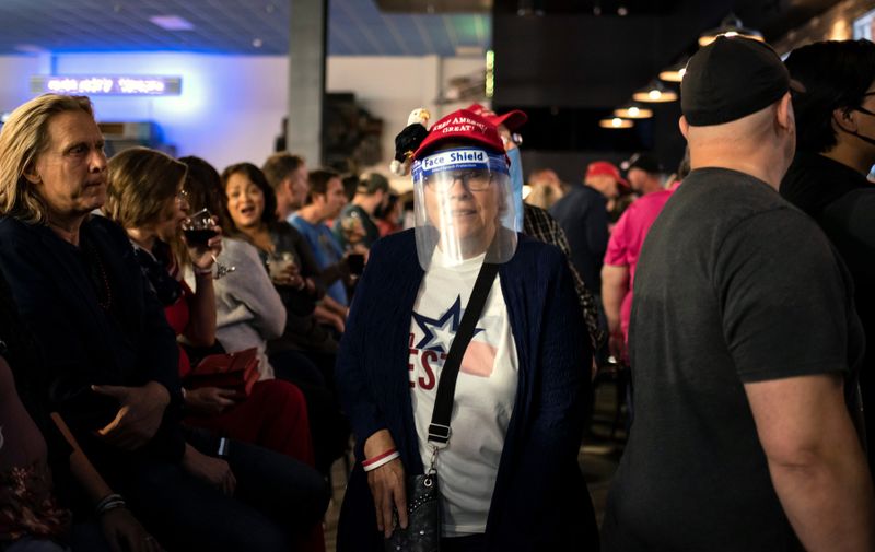 A supporter of US President Donald Trump enters a watch party for Republicans on election day on November 3, 2020 in Austin, Texas.,Image: 567264530, License: Rights-managed, Restrictions: , Model Release: no