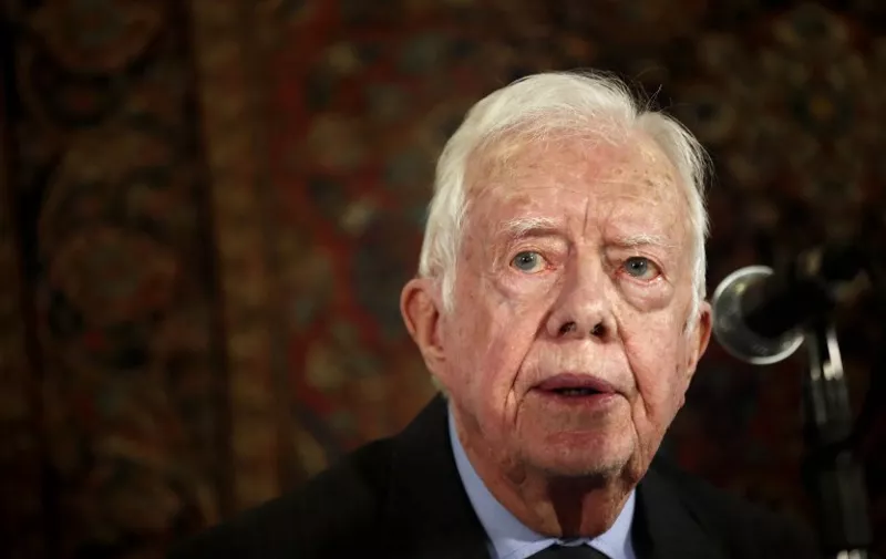 (FILES) - File picture taken May 2, 2015 shows former US president Jimmy Carter, member of The Elders group of retired prominent world figures, addressing journalists during a press conference in an hotel in Jerusalem. Former US president Carter said August 12, 2015 that recent surgery had shown he has cancer and that it has spread from his liver. The 39th president recently underwent surgery to remove a small mass from his liver. "That procedure revealed that I have cancer that now is in other parts of my body. I will be rearranging my schedule as necessary so I can undergo treatment," he said, in a brief statement. AFP PHOTO/ THOMAS COEX