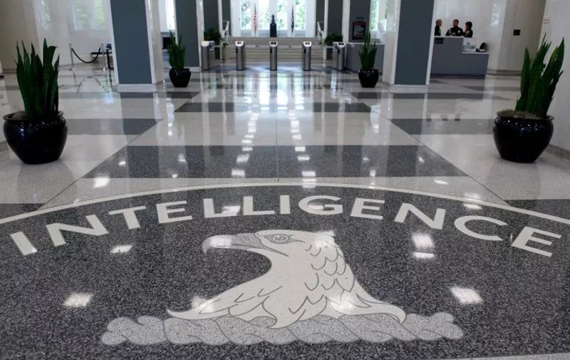 The Central Intelligence Agency (CIA) logo is displayed in the lobby of CIA Headquarters in Langley, Virginia, on August 14, 2008. AFP PHOTO/SAUL LOEB / AFP PHOTO / SAUL LOEB