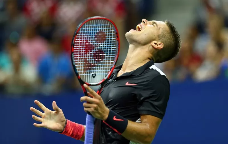 NEW YORK, NY - AUGUST 31: Borna Coric of Croatia reacts after a point to Rafael Nadal of Spain during their Men's Singles First Round match on Day One of the 2015 US Open at the USTA Billie Jean King National Tennis Center on August 31, 2015 in the Flushing neighborhood of the Queens borough of New York City.   