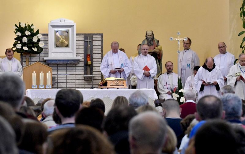 Pilgrims attend a mass at the church of the Holy Mother Mary on May 15, 2017 in southern Bosnian town of Medjugorje. - Pope Francis on May 13, 2017 expressed serious doubts regarding reported daily apparitions of the Virgin at Medjugorje in Bosnia, a site which attracts a million pilgrims annually. (Photo by ELVIS BARUKCIC / AFP)
