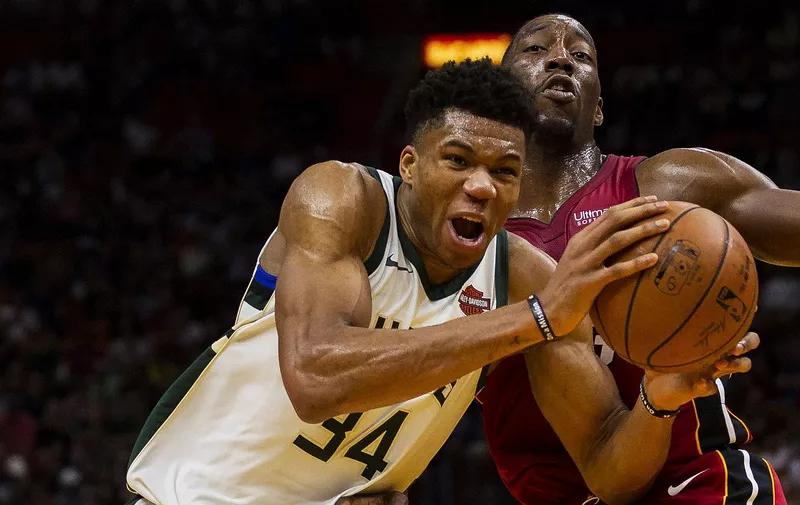 Milwaukee Bucks forward Giannis Antetokounmpo (34) fights to get past Miami Heat center Bam Adebayo (13) in the fourth quarter on Sunday, Jan. 14, 2018 at the AmericanAirlines Arena in Miami, Fla., Image: 360156462, License: Rights-managed, Restrictions: NC WEB BL LN, Model Release: no, Credit line: Profimedia, Newscom