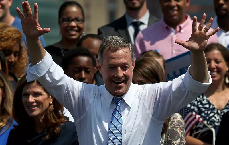 BALTIMORE, MD - MAY 30: Former Maryland Gov. Martin O'Malley celebrates after officially announcing his candidacy for the U.S. presidency during an event at Federal Hill Park May 30, 2015 in Baltimore Maryland. O'Malley joins Sen. Bernie Sanders and former Secretary of State Hillary Clinton in seeking the Democratic nomination.   Win McNamee/Getty Images/AFP