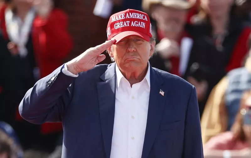Former US President and Republican presidential candidate Donald Trump arrives to speak at a Buckeye Values PAC Rally in Vandalia, Ohio, on March 16, 2024. (Photo by KAMIL KRZACZYNSKI / AFP)