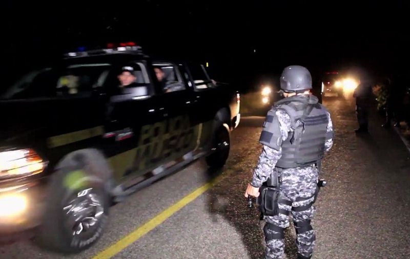 Grab taken from a video of a police deployment on April 7, 2015 on a Jalisco state road, Mexico, where at least 15 police officers were killed in an ambush carried out by a gang called &#8220;Jalisco New Generation Drug Cartel&#8221;. AFP PHOTO /Ivan Israel Orozco Garcia