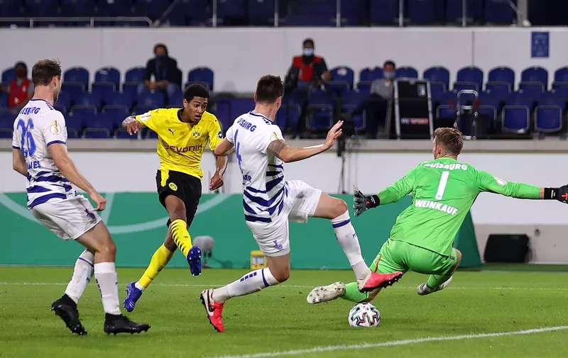DUISBURG, GERMANY - SEPTEMBER 14: Jude Bellingham of Borussia Dortmund scores his sides second goal during the DFB Cup first round match between MSV Duisburg and Borussia Dortmund at Schauinsland-Reisen-Arena on September 14, 2020 in Duisburg, Germany. (Photo by Lars Baron/Getty Images)