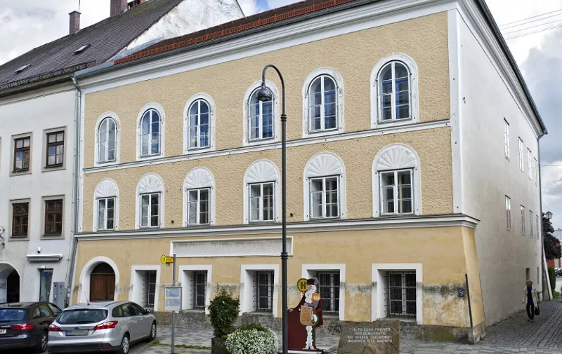 Picture taken on September 20, 2012 shows the house were Adolf Hitler was born in Braunau, Austria. The interior ministry is appealing to other ministries to take over Hitler's birthplace in Braunau, amid a years-long debate over what should become of the building.The interior ministry has rented the large pale yellow house where the future Nazi leader was born since 1972 and variously sublet it to a technical institute and an aid organisation.  AFP PHOTO / APA / MANFRED FESL   +++ AUSTRIA OUT +++ / AFP PHOTO / APA / MANFRED FESL