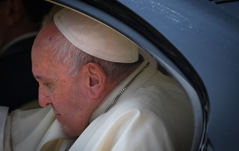 Pope Francis sits in a car as he prepares to leave the Blessed Nicholas Boonkerd Kitbamrung Shrine in Bangkok on November 22, 2019. (Photo by Mohd RASFAN / AFP)