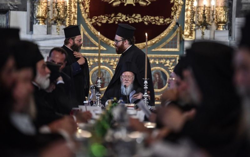 Ecumenical Patriarch Bartholomew I is seen at the Hagia Triada Greek Orthodox church on September 1, 2018 in Istanbul, during the meeting (synaxis) of the Hierarchy of the Ecumenical throne. - Ecumenical Patriarch Bartholomew I on Friday hosted Russian Orthodox Patriarch Kirill in Istanbul for hugely unusual talks focused on whether Ukraine will get an independent church, a move strongly opposed by Moscow. (Photo by OZAN KOSE / AFP)