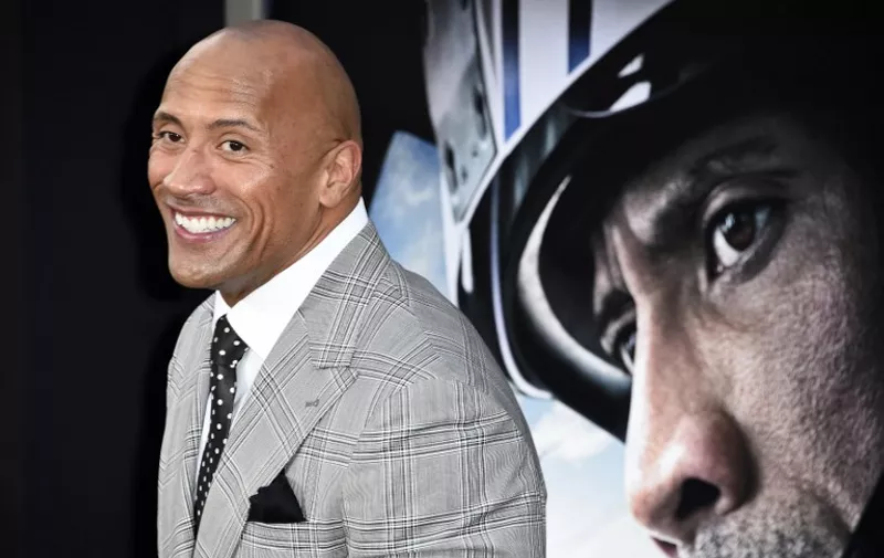 Actor Dwayne Johnson attends the premiere of Warner Bros Pictures' film San Andreas, May 26, 2015 at TCL Chinese Theater in Hollywood , California.   AFP PHOTO / ROBYN BECK
