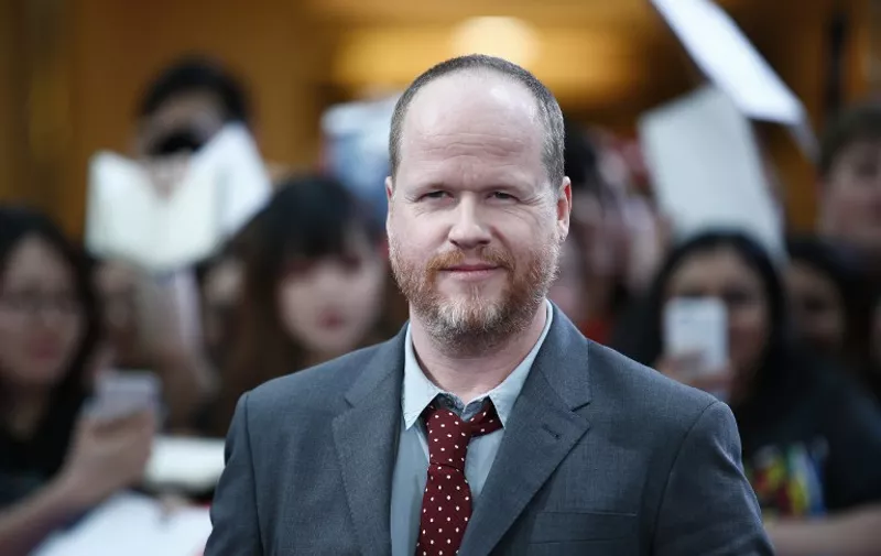 US screenwriter and director Joss Whedon poses on the red carpet for the European premiere of the film 'Avengers: Age of Ultron' in London on April 21, 2015.  AFP PHOTO / JUSTIN TALLIS