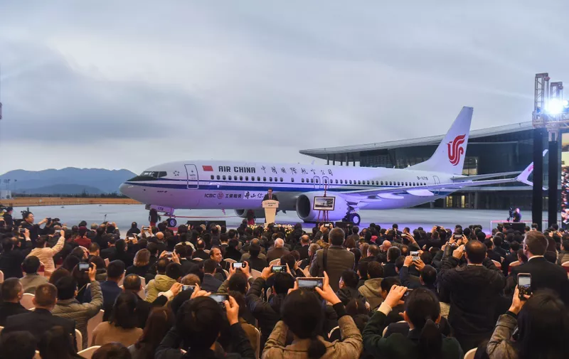 December 15, 2018 - Zhoushan, Zhejiang, China: A Boeing 737 MAX 8 airplane is delivered to Air China at a ceremony held at Boeing Zhoushan 737 Completion and Delivery Center. Boeing Zhoushan 737 Completion and Delivery Center in east China's Zhejiang Province delivered its first plane of the 737 family to Air China on Saturday. The delivery marked the U.S. aerospace giant and its Chinese partner Commercial Aircraft Corporation of China, Ltd (COMAC) put into operation of their joint plant, the first such Boeing facility outside the United States. The 737 MAX 8 airplane was assembled at Boeing's Renton plant in the United States. It flied to China's coastal city of Zhoushan and received the completion works. On March 11, 2019, China announced its grounding of all Boeing 737 MAX 8 airplanes after its second fatal crash in five months. All 157 people aboard a Boeing 737-800 MAX on an Ethiopian Airlines flight died on March 10, 2019 as the aircraft crashed around Bishoftu town a few minutes after taking off from Addis Ababa Bole International Airport to Nairobi, Kenya. On Oct. 28, 2019, a Boeing 737 MAX 8 on a Lion Air flight crashed into the sea off the Indonesian capital, Jakarta, killing all 189 people onboard., Image: 418778484, License: Rights-managed, Restrictions: No publication in Australia, Belgium, China, France, Poland and Russia, Model Release: no, Credit line: Profimedia, Polaris