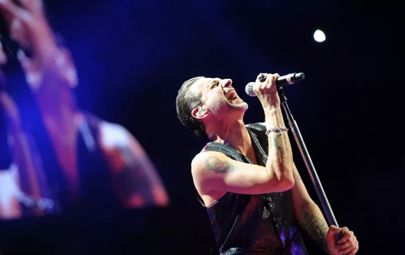 NEW YORK, NY - SEPTEMBER 06: Dave Gahan of Depeche Mode on stage during at Barclays Center on September 6, 2013 in New York City.   Dave Kotinsky/Getty Images/AFP