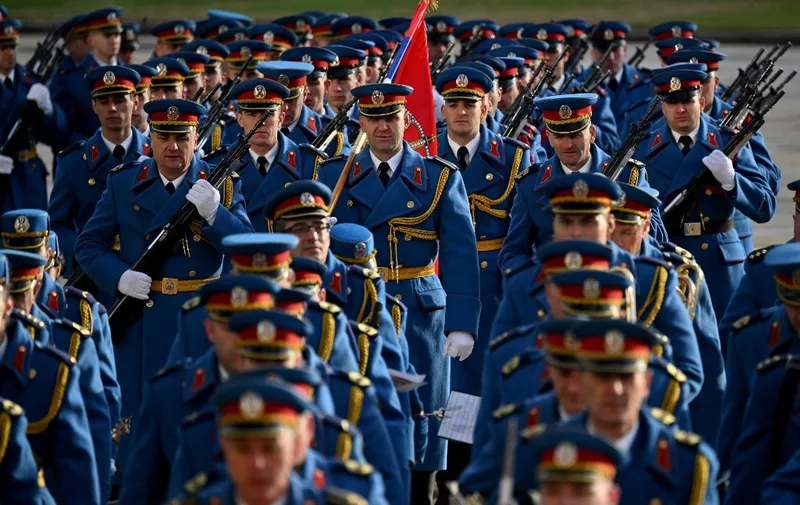 Serbian Army honor guard arrives for Italy's Prime Minister welcome ceremony before a meeting with Serbia's president in Belgrade on December 3, 2023. (Photo by Andrej ISAKOVIC / AFP)