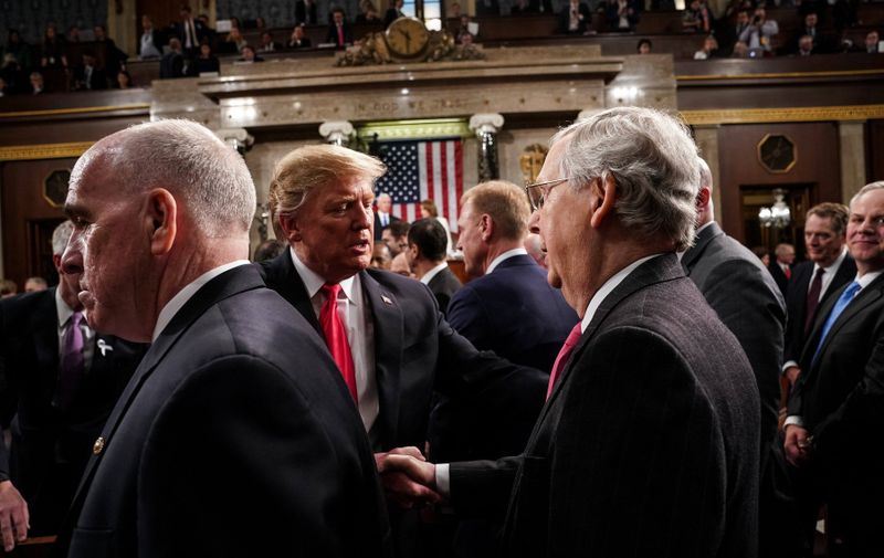 President Trump shook hands with Senator Joe Manchin, D-WV, next to Supreme Court Justice Brett Kavanaugh after the State of the Union at the Capitol in Washington, DC on February 5, 2019. 
Credit: Doug Mills / Pool, via CNP.
05 Feb 2019
 
Credit: Doug Mills / Pool, via CNP., Image: 412269559, License: Rights-managed, Restrictions: NO Australia, New Zealand, Model Release: no, Credit line: Profimedia, Mega Agency