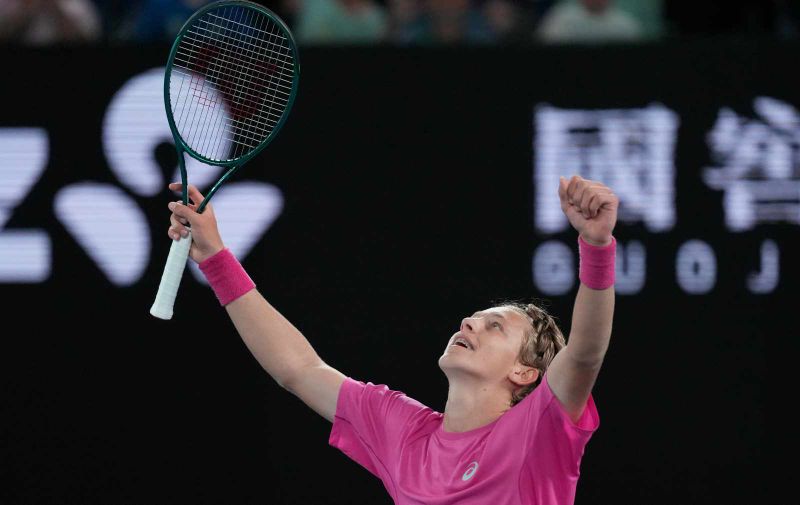 Ziga Sesko of Slovenia celebrates after defeating Keaton Hance of the U.S. in the boy's singles final at the Australian Open tennis championship in Melbourne, Australia, Sunday, Feb. 1, 2026. (AP Photo/Dar Yasin)