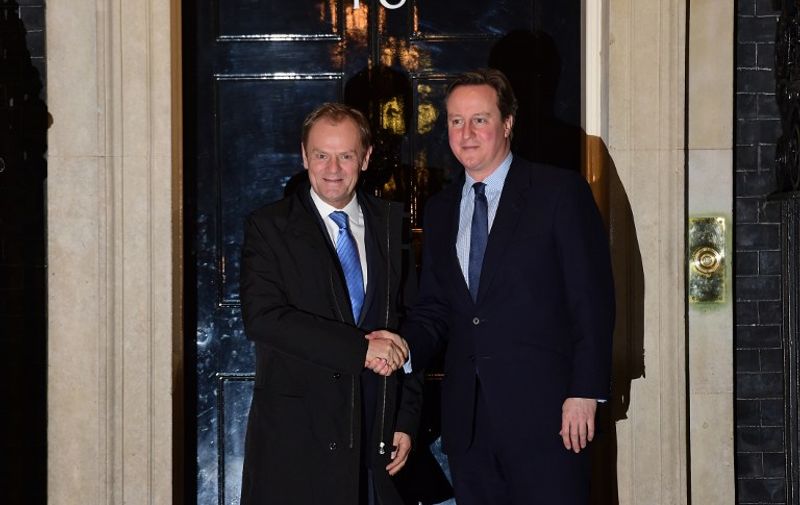 British Prime Minister David Cameron (R) greets European Council President Donald Tusk outside No 10 Downing Street in central London on January 31, 2016, ahead of their meeting.
Prime Minister David Cameron is to propose curbing the benefits European Union migrants can claim in negotiations with EU president Donald Tusk ahead of a referendum on whether Britain should leave the bloc. Under Cameron's proposal, an "emergency brake" to in-work benefits would come into force immediately after the referendum, due to be held by 2017.
 / AFP / Leon Neal
