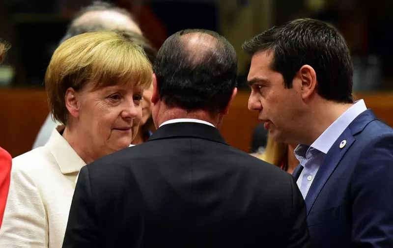 (From L) German Chancellor Angela Merkel, French President Francois Hollande, and Greek Prime Minister Alexis Tsipras confer prior to the start of a summit of Eurozone heads of state in Brussels on July 12, 2015. The EU cancelled a full 28-nation summit to decide whether Greece stays in the European single currency as a divided eurozone struggled to reach a reform-for-bailout deal.  AFP PHOTO / JOHN MACDOUGALL
