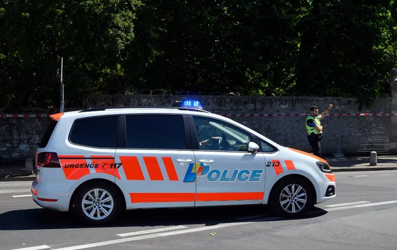 A car of Geneva Police move next to the "Villa La Grange", in Geneva, on June 11, 2021, where US President and Russian President will have their meeting on June 16. Russian leader Vladimir Putin and US President Joe Biden are to meet on June 16 amid the biggest crisis in ties between their two countries in recent history. (Photo by Fabrice COFFRINI / AFP)